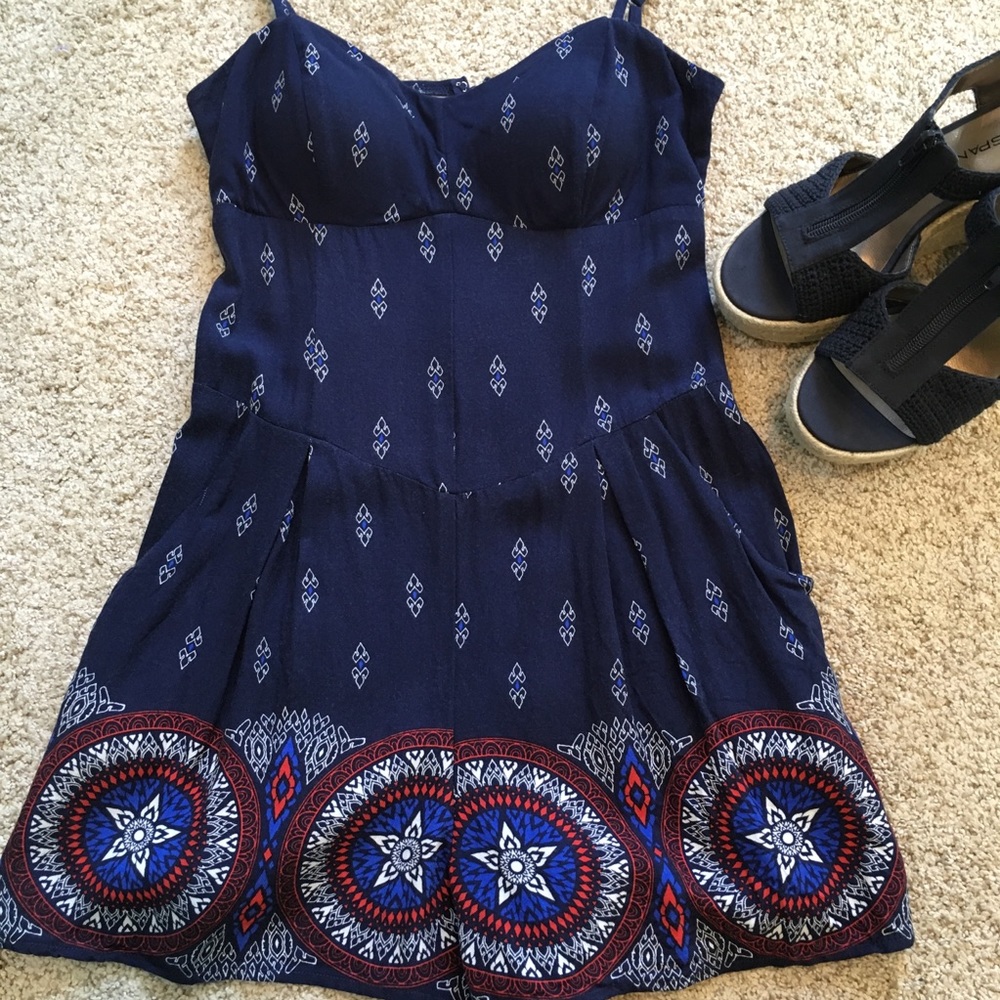 Adorable romper, size medium. Red, white and blue.